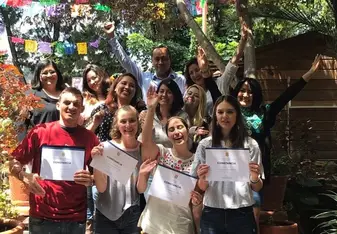 A group of teachers celebrating qualification 