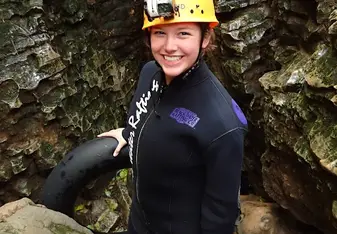 Leah adventuring through caves