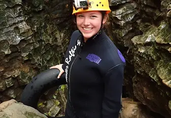 Leah adventuring through caves