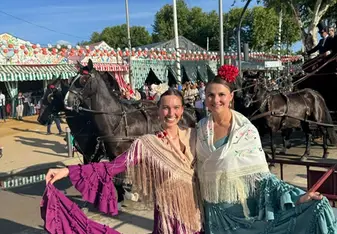 Lily and a friend in traditional Spanish clothing