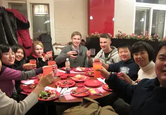 GAC Interns eating on table 