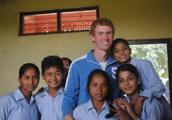 Mitchell with his students in Nepal