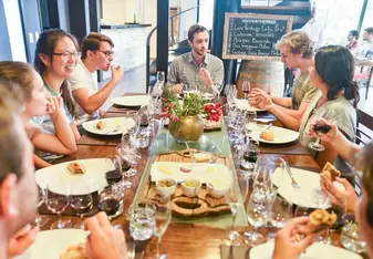 Murphy and students enjoying a meal