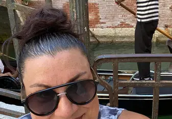 Gina on a gondala ride in Venice