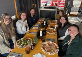 Carolina and friends enjoy a meal together