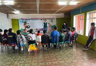 Volunteers teach children through a variety of programs.