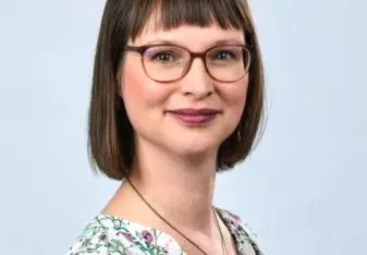 Sophia poses for a professional headshot