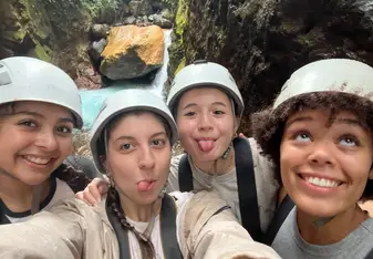 Hayley and friends make a funny face for a photo