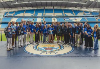 Students at the Etihad Stadium