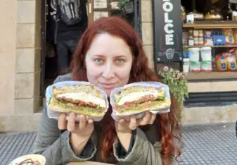 Cassia Scarinci with a delicous sandwhich