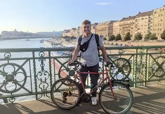Ben on bike by Danube