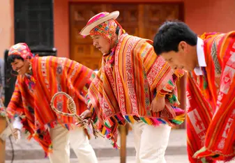 Men in traditional clothing in Peru.