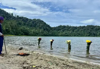 International students discovering the sacred Laguna Chicabal in Guatemala