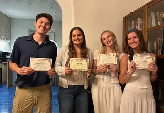Students celebrating their Spanish learning journey at Celas Maya in Guatemala
