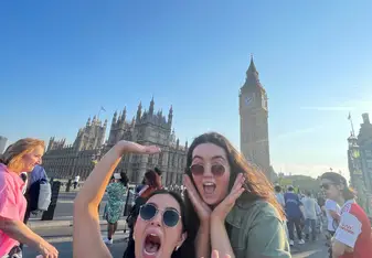Two women in front of Big Ben in London