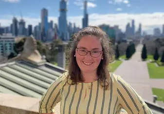 Standing in front of the city in Melbourne