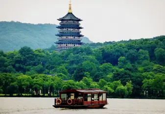 Hangzhou west lake and boat on the water 