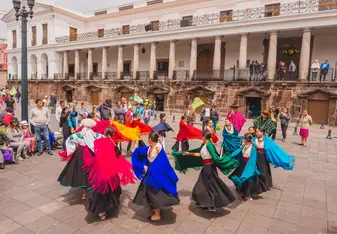 Group dancing in Quito square