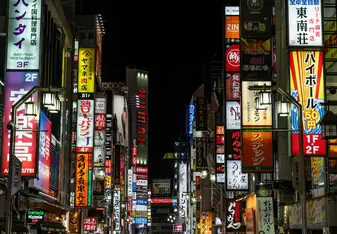 Vibrant night life and shop signs in Tokyo, Japan