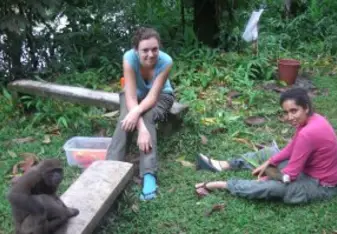 Cynthia and fellow Ecuador Volunteer participant with local wildlife
