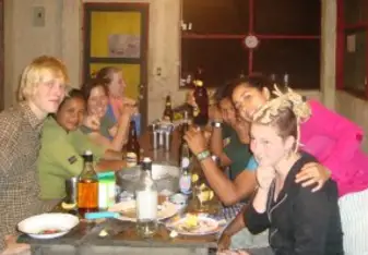 Cynthia dining with fellow Ecuador Volunteer participants