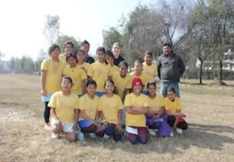 Woman with football team