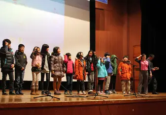 Kylie with her students