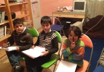 Eager kids in class in Palestine