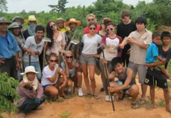 Volunteer helping out community work in Thailand 