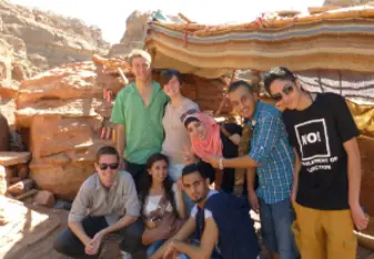 students posing outside in amman jordan