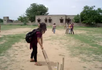 playing cricket