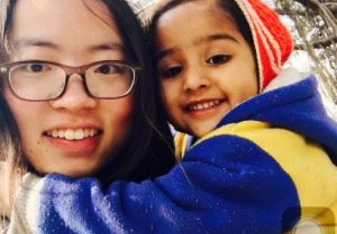 Volunteer with young girl in Nepal