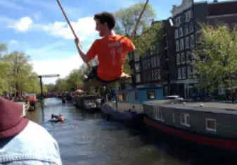 A man on a swing.