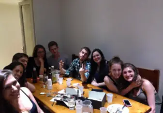 A group of young students gathered together.