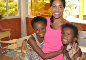 Volunteer and local kids 