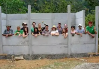 House building with volunteers.