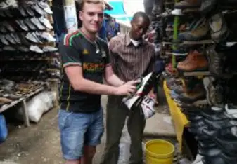 Dan working at the local shoe stall!