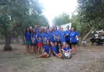 group of people smiling outside