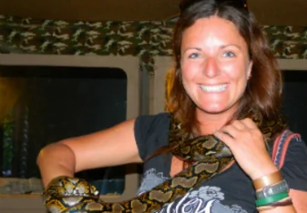 woman holding a snake