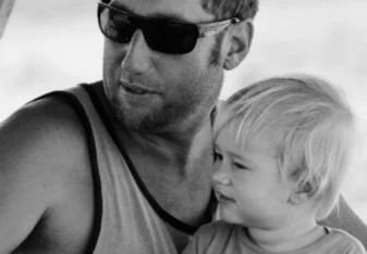 father and son on the beach in Nosara, Costa Rica