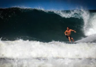 man surfing in Nosara Costa Rica