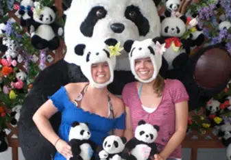 Ashely with stuffed pandas!