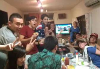 Everyone smiling towards the camera