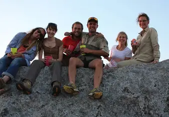Group of volunteers on a rock