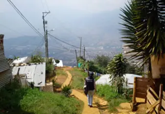 A Kiva loan officer enjoys the views in Colombia