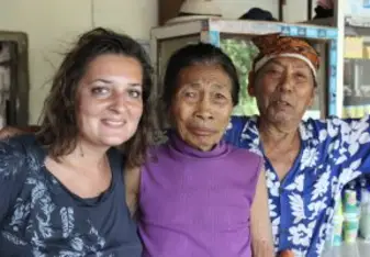 Madalina with the local people