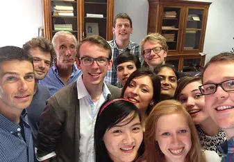 Part of the MAAS group with professors after curriculum meeting