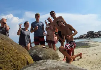 Finding coconuts washed up on the beach. mmmm