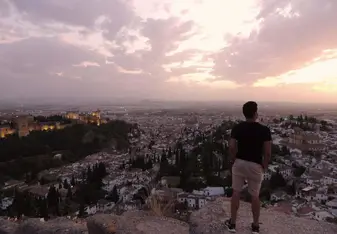 View of the city from the mountains with the Alhambra to my left.