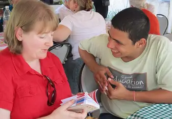 Teach English to youth and adult students.